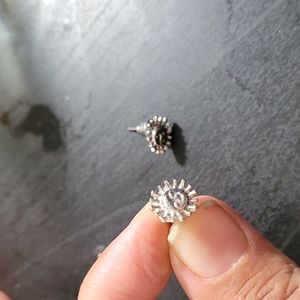 Silver sun earrings